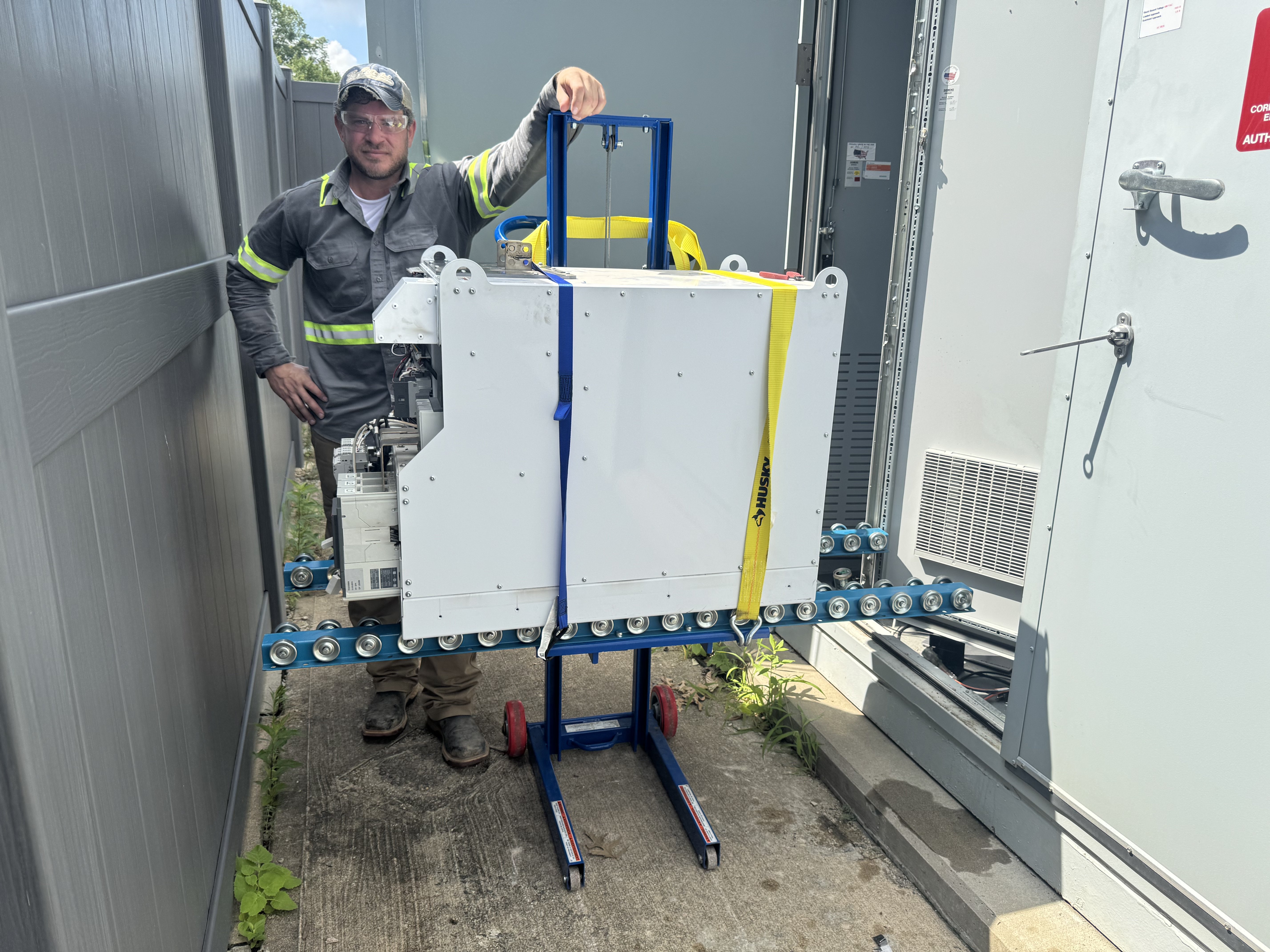 Stokes Energy field work — battery module installation at BESS site